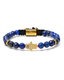 Blue lapis bead bracelet with gold hamsa pendant, black cord center bar, gold details.