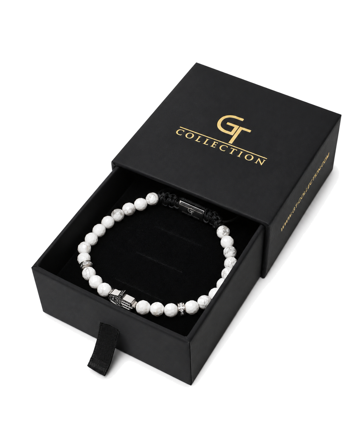 Howlite bead bracelet shown in black gift box with G Collection logo