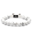 White howlite bead bracelet with black G-Collection label and elastic cord