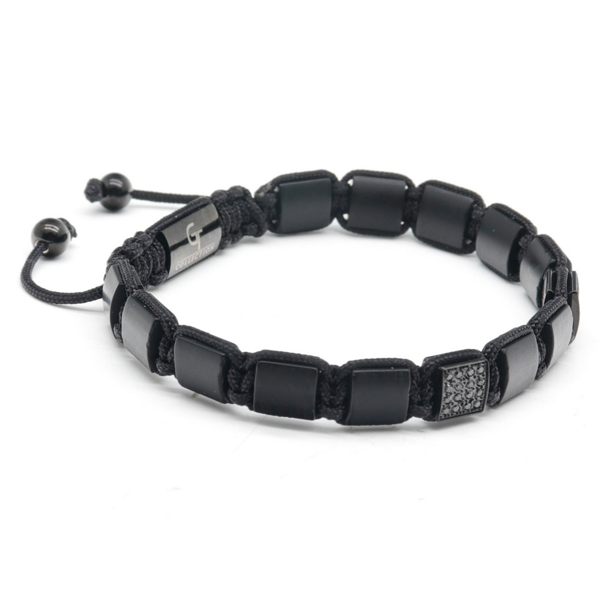 Black bead bracelet with woven cord, matte rectangular links, and bead toggle ends