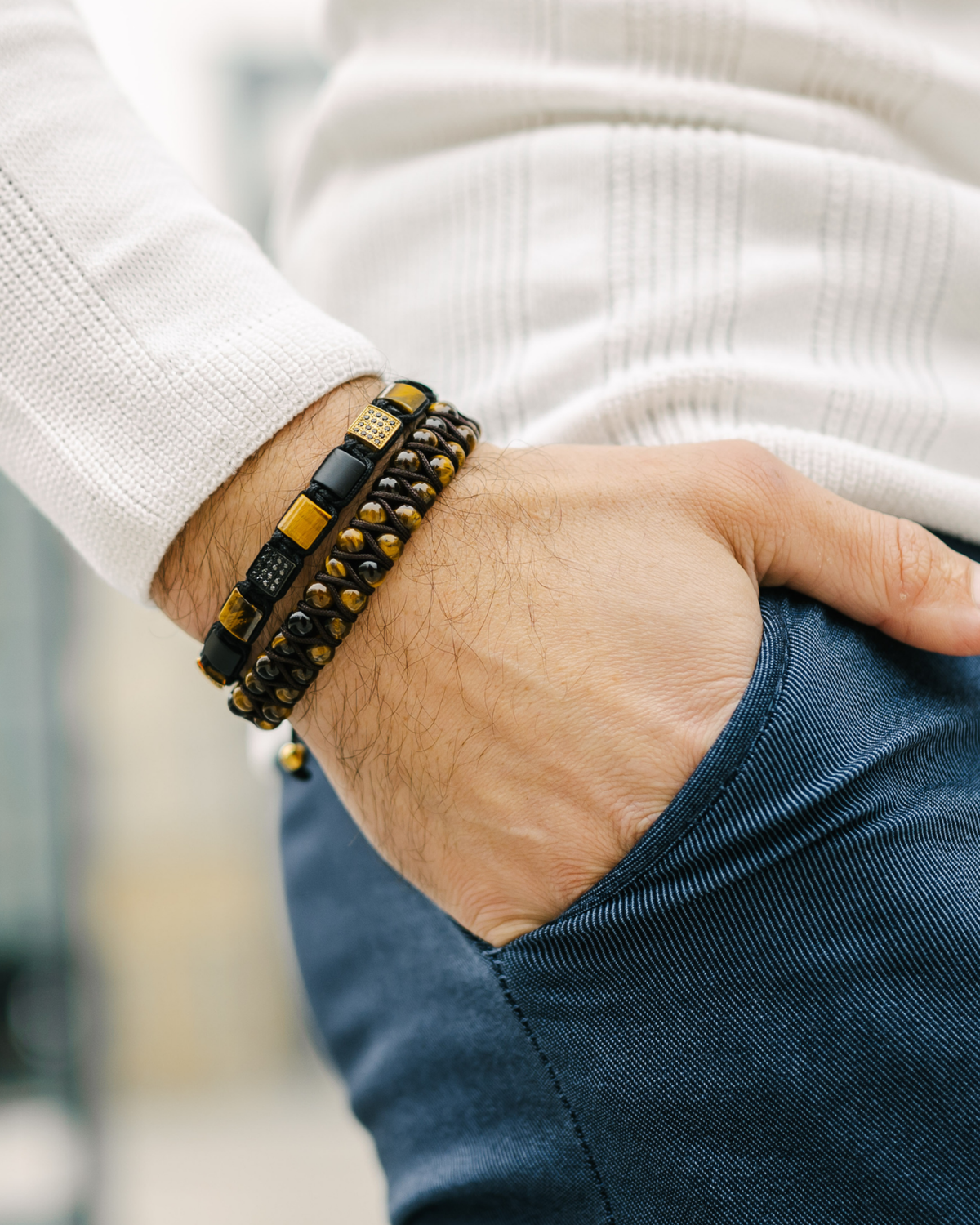 Tiger eye bead double-row bracelet with black accents and braided clasp