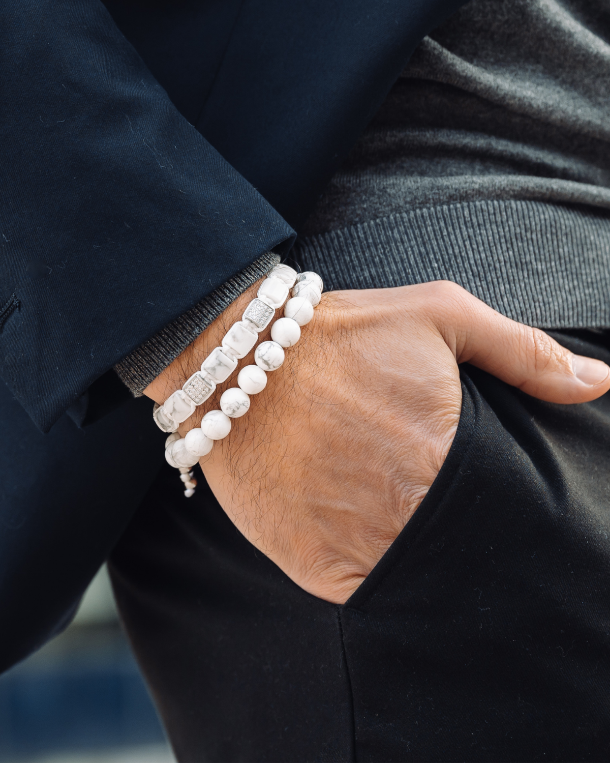 Calm Stack white howlite beaded bracelets on wrist with silver clasps and spacer accents