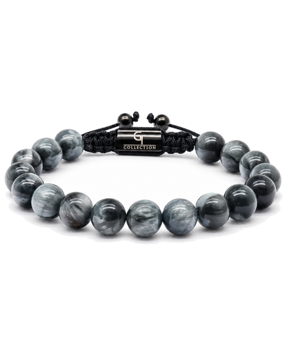 Gray beaded bracelet with black cord center plate and adjustable knot