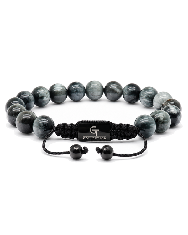 Gray beaded bracelet with black fabric strap, G collection plate, and beads