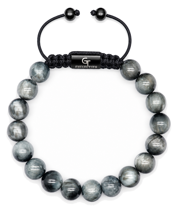 Gray stone beaded bracelet with black cord center plate and two black bead toggles