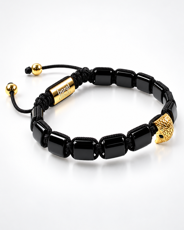 Black braided bracelet with gold-plate accent and glossy black bead link segments