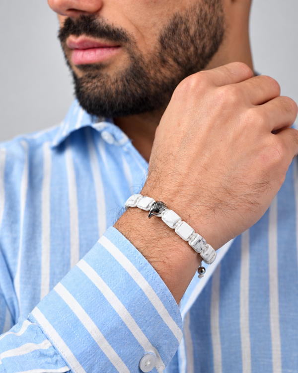 Man wearing white howlite bead American Eagle bracelet on his wrist