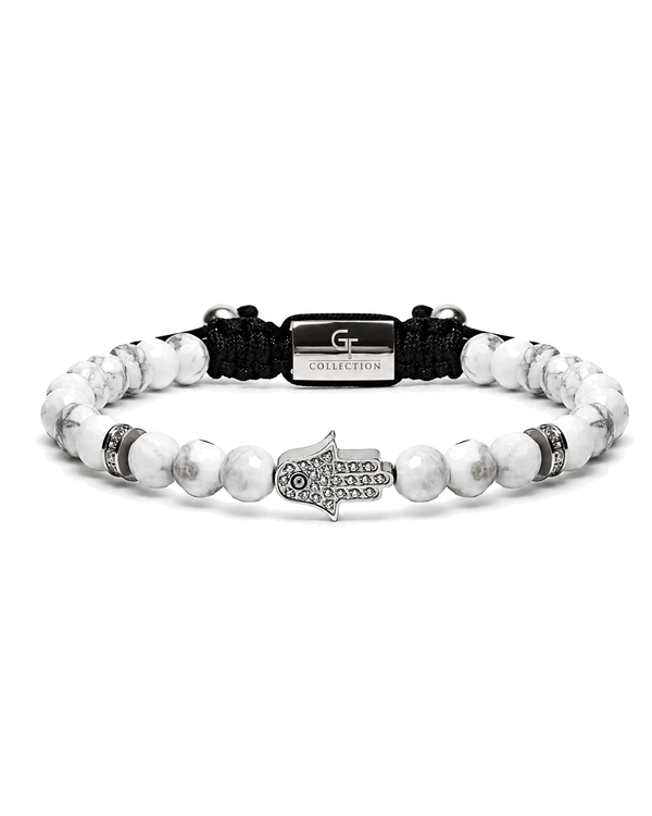 White howlite bead bracelet with black cord and engraved hamsa hand charm