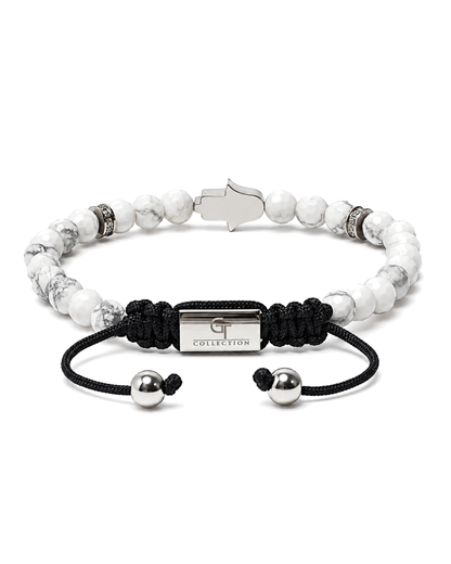 White howlite bead bracelet with black cord and G Collection label center