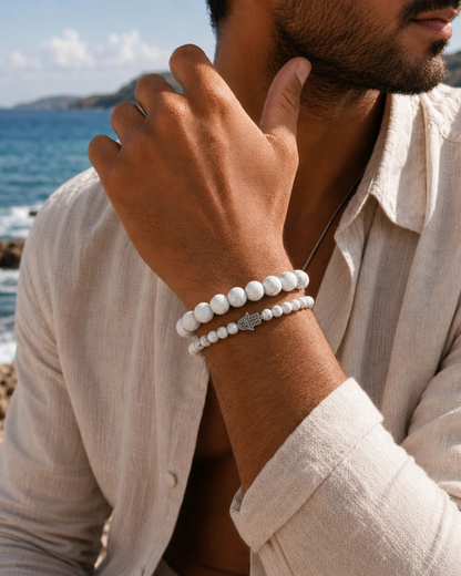 Howlite bead bracelets on wrist with silver-tone spacer beads
