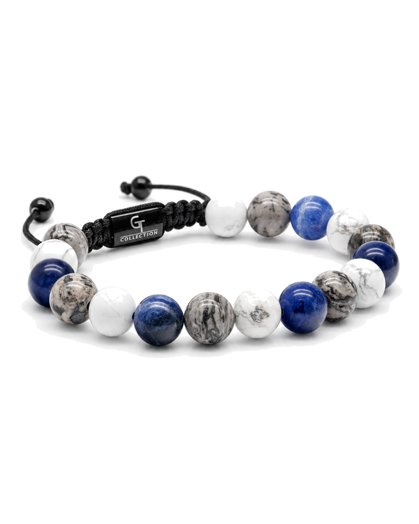 Single-row beaded bracelet with blue, white, and gray stones and black cord clasp