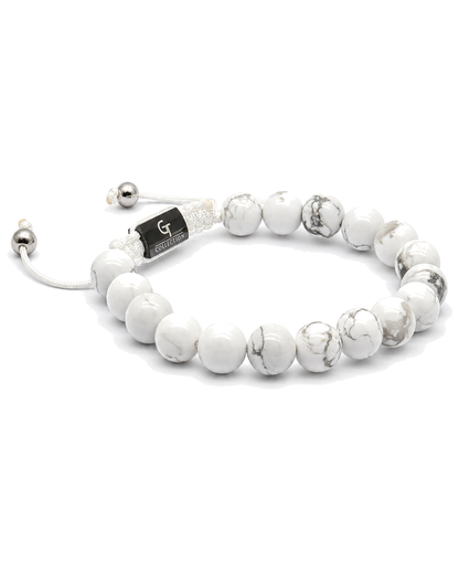 White howlite bead single-row bracelet with silver-tone balls and elastic cord