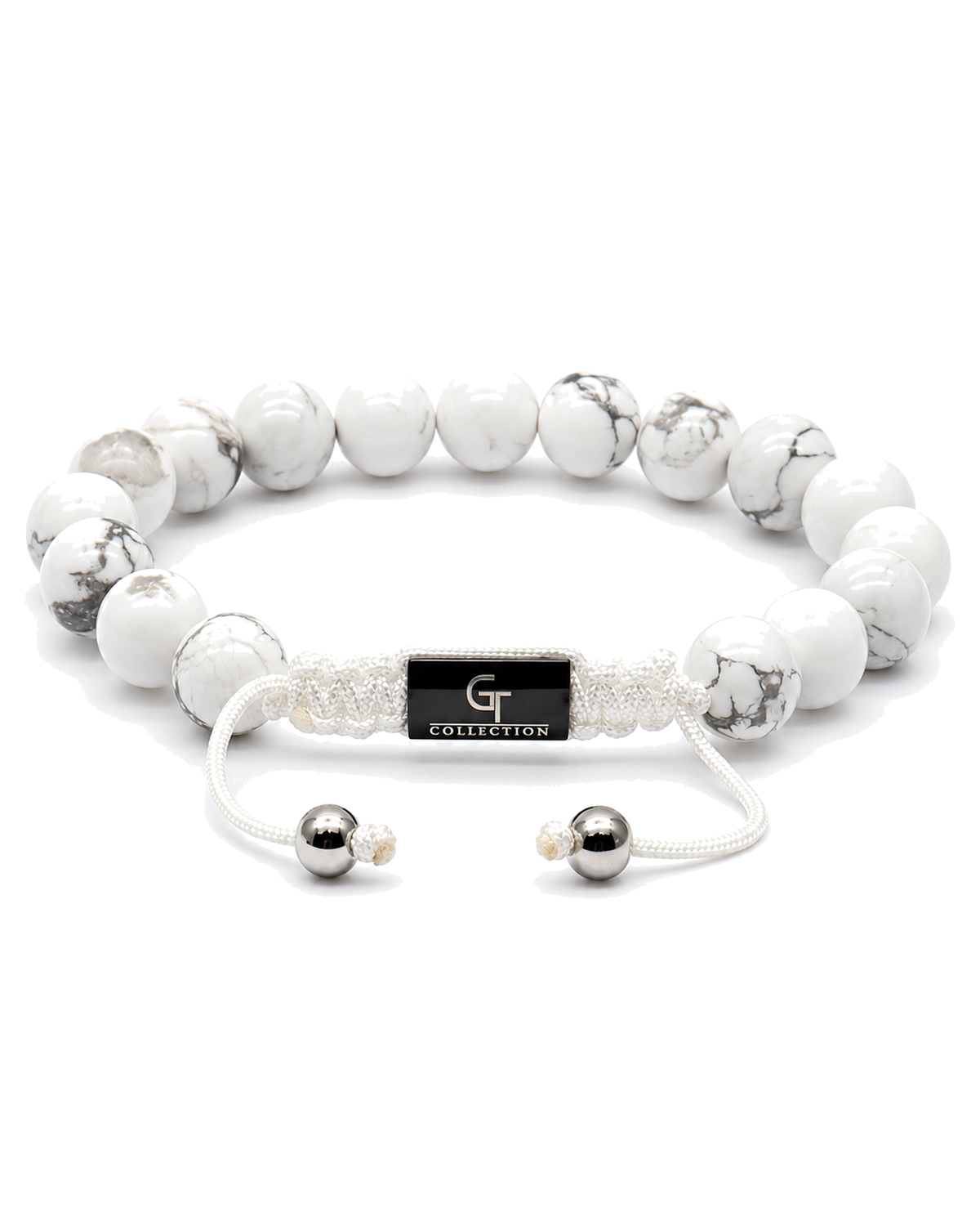 White howlite bead bracelet with black G-Collection centerpiece and cord tie