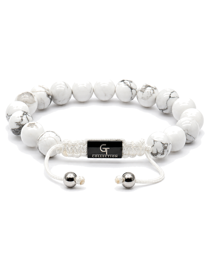 White howlite bead bracelet with black G-Collection centerpiece and cord tie