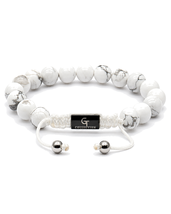 White howlite bead bracelet with black G-Collection centerpiece and cord tie