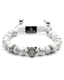 White howlite bead bracelet with crown-like silver centerpiece and bead rings