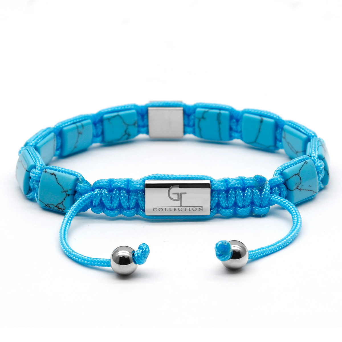 Turquoise flat bead bracelet with silver-tone clasp and center geometric charm