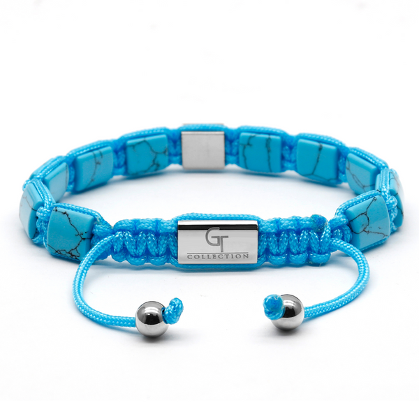 Turquoise flat bead bracelet with silver-tone clasp and center geometric charm