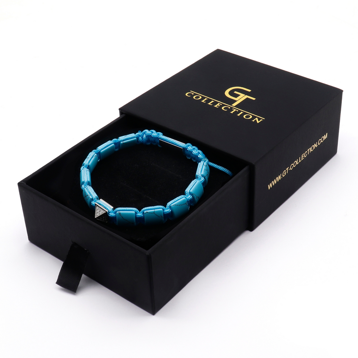 Turquoise flat bead bracelet in a black gift box with silver-tone clasp