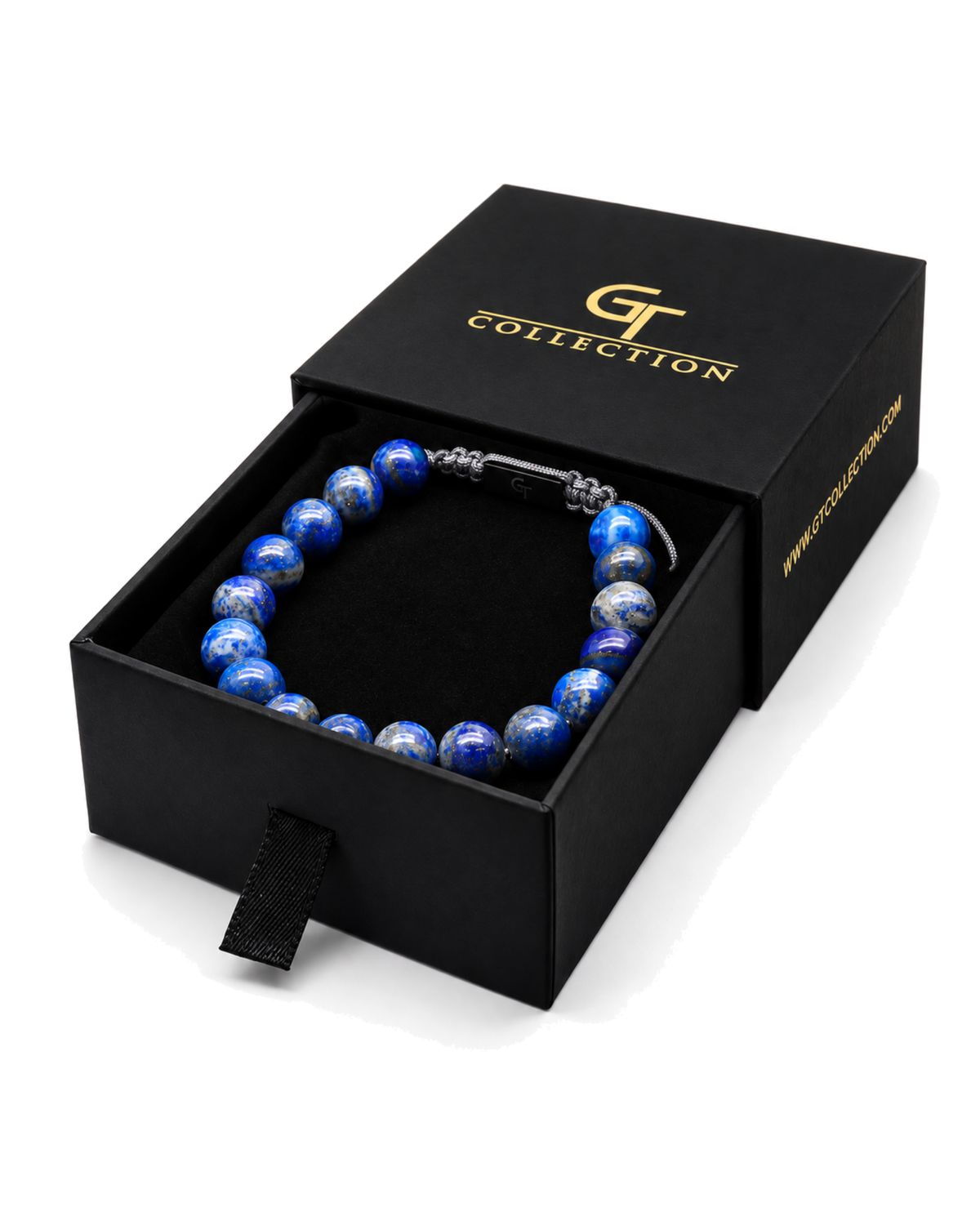 Blue lapis lazuli bead bracelet displayed in a black gift box