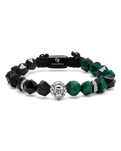 Lion charm bracelet with black beads, green faceted stones, and central black logo tag.
