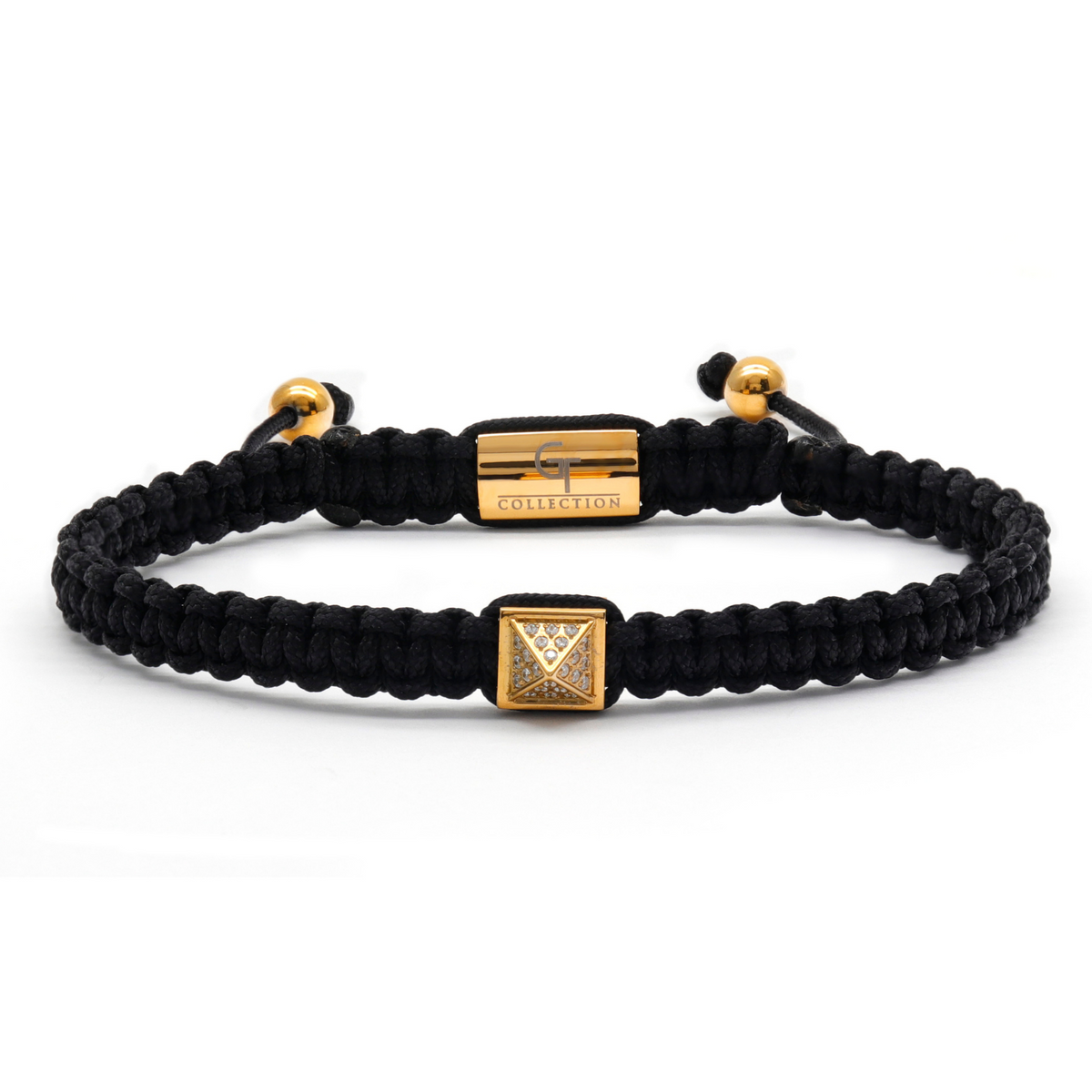 Men's black braided bracelet with gold pyramid zircon accent
