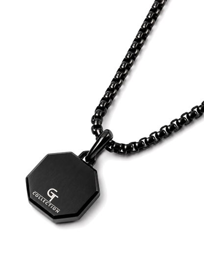 Black octagonal pendant with logo detail on curb chain