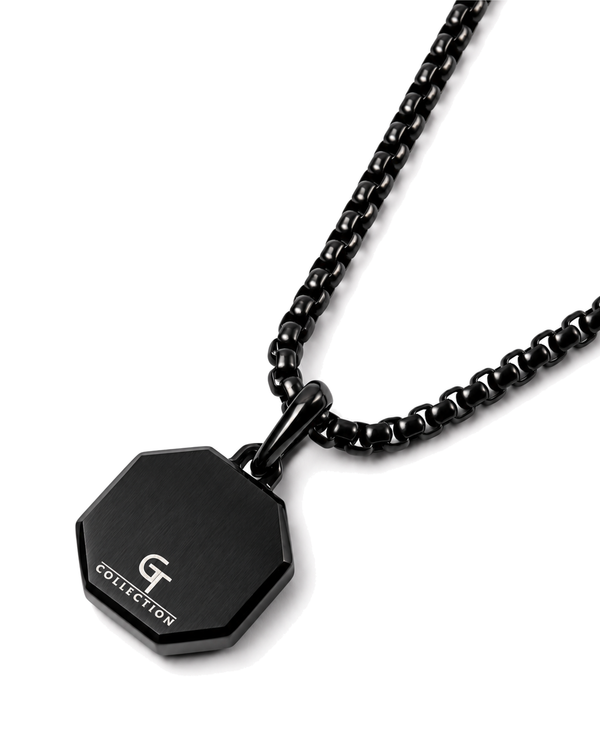 Black octagonal pendant with logo detail on curb chain