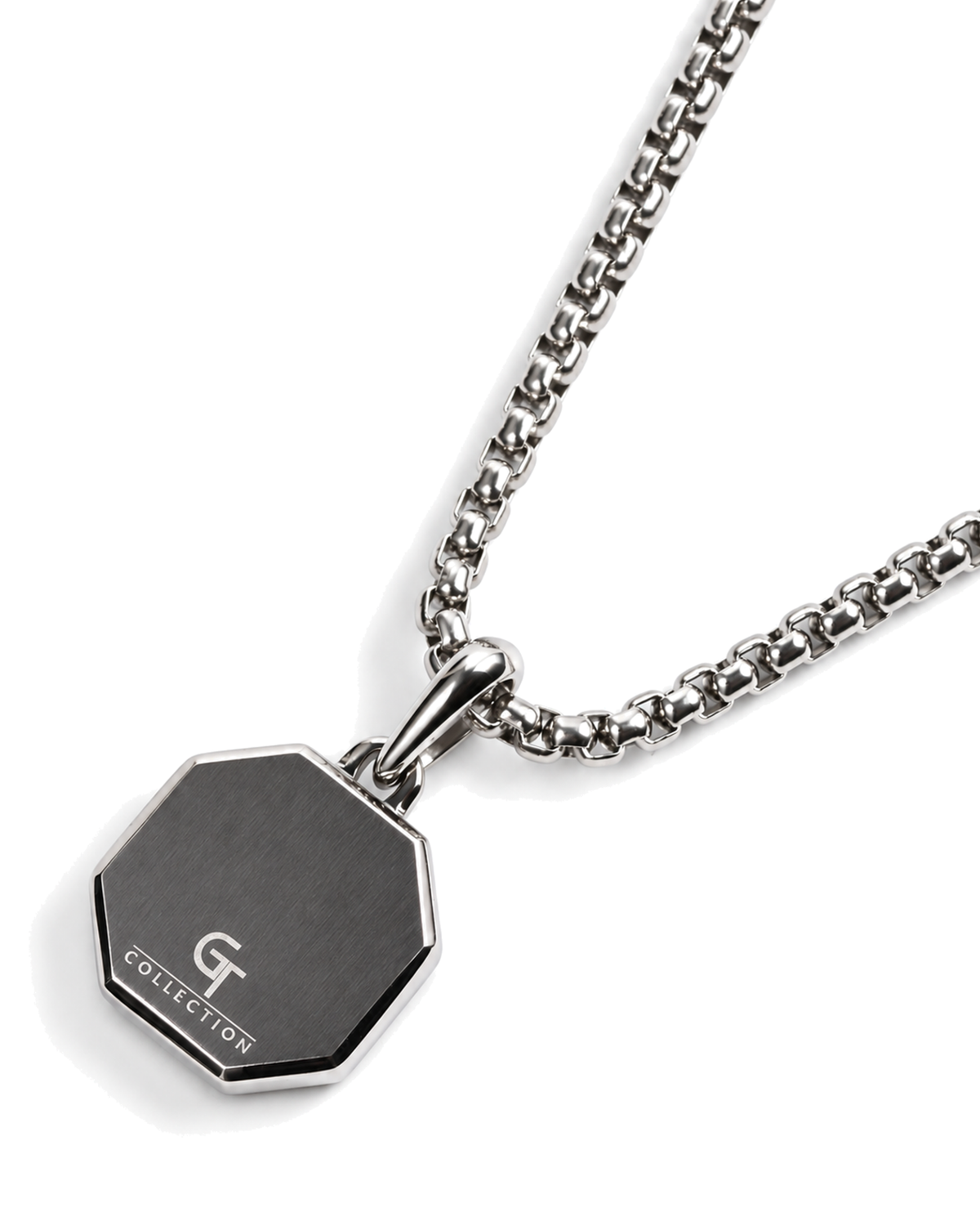 Silver-tone octagonal pendant necklace with black geometric stone charm