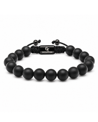 Single-row black bead bracelet with clasp and small toggle charm