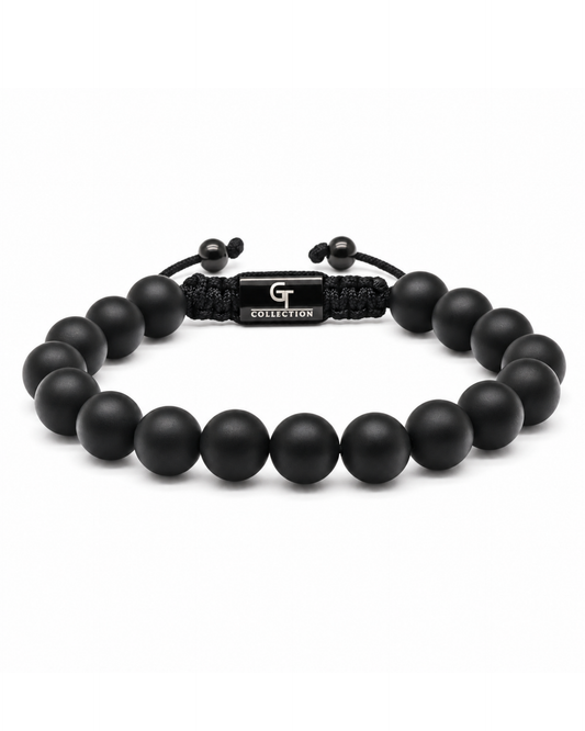 Single-row black bead bracelet with clasp and small toggle charm