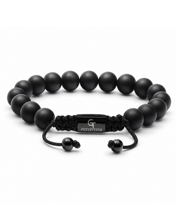 Black bead bracelet with adjustable cord ends and rectangular center plate