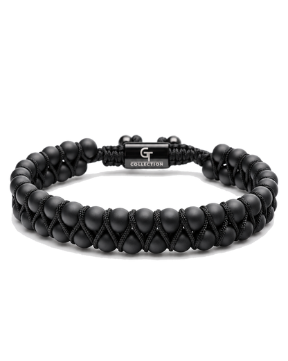 Black double-row beaded bracelet with black cord tie and G Collection metal centerpiece