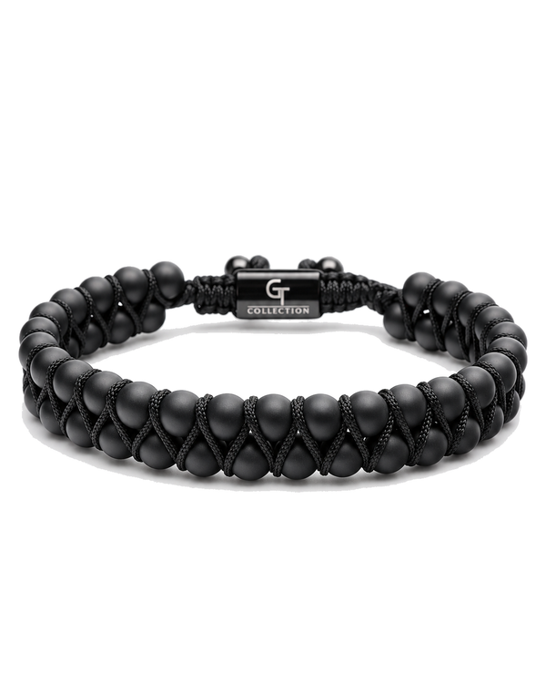 Black double-row beaded bracelet with black cord tie and G Collection metal centerpiece