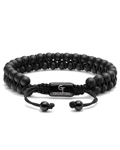 Black double-row beaded bracelet with black drawstring cord and G Collection clasp