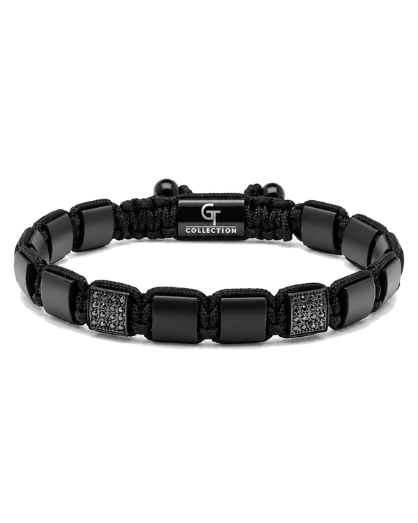 Black bead bracelet with braided rope, square links, and engraved "G COLLECTION" plate