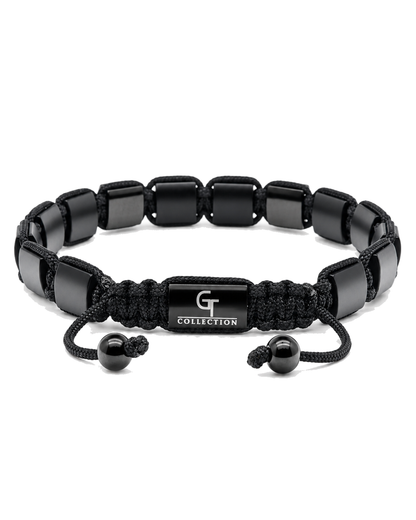 Black bead bracelet with central "G COLLECTION" plate and braided pull cords