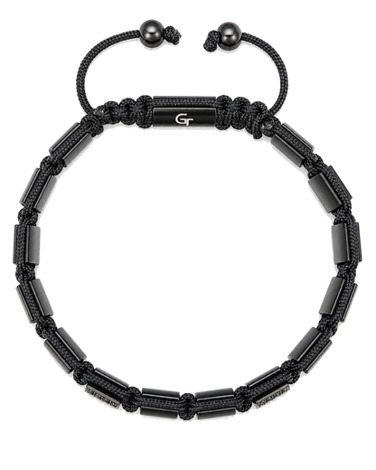 Black beaded bracelet top view with braided cord, metal end beads, and central plate