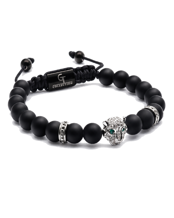 Black onyx bead bracelet with silver ring details and leopard charm, adjustable cord