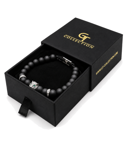 Black onyx beaded bracelet in gift box, silver leopard charm with green stone