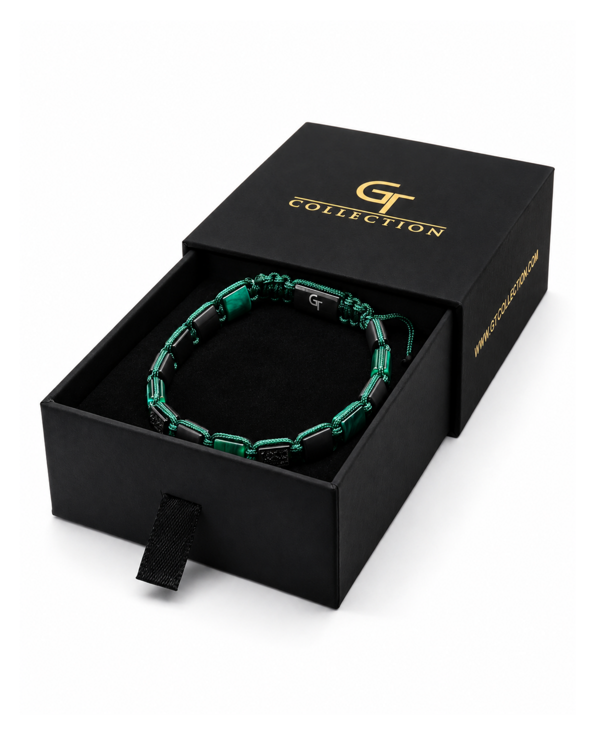 Green and black bead bracelet in black gift box with gold logo on lid