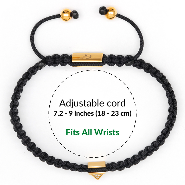 Black cord bracelet with gold bar clasp and square pyramid charm, adjustable