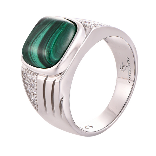 Sterling silver band ring with green malachite oval centerpiece and side clear stones