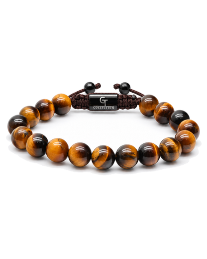 Tiger eye bead bracelet with dark braided cord and center clasp detail