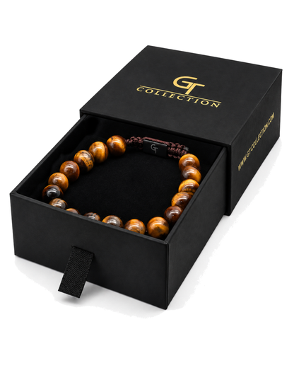 Tiger eye bead bracelet shown in a black presentation box with cord clasp
