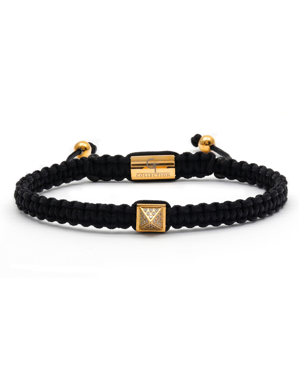 Black braided cord bracelet with gold pyramid zircon charm and adjustable beads